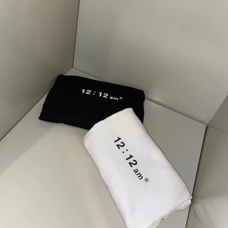 【١٢:١٢ صباحًا】تيشيرت بشعار سنترال بارك ٢٠٢٣